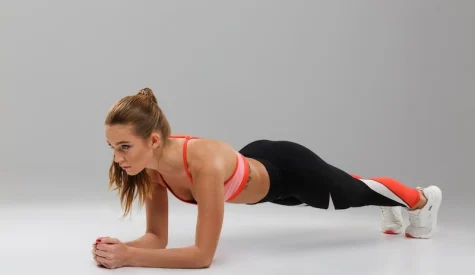 Clinical Pilates plank exercise with a fit sportsgirl at Morley Physiotherapy